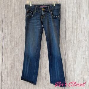 Levi’s Woman’s Sz 7M Med-Wash Jeans Stretch Yellow Stitching & Logos